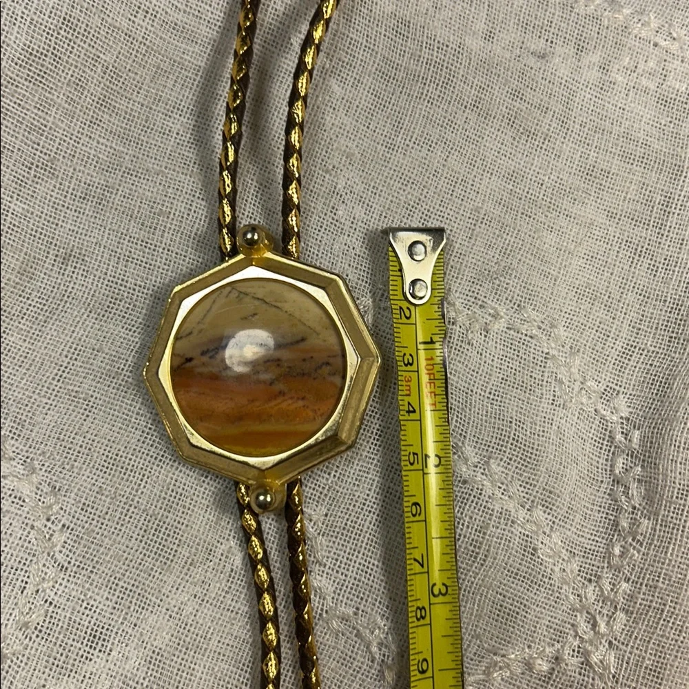 Vintage Bolo tie western leather, with ornate medallion, space for silver dollar